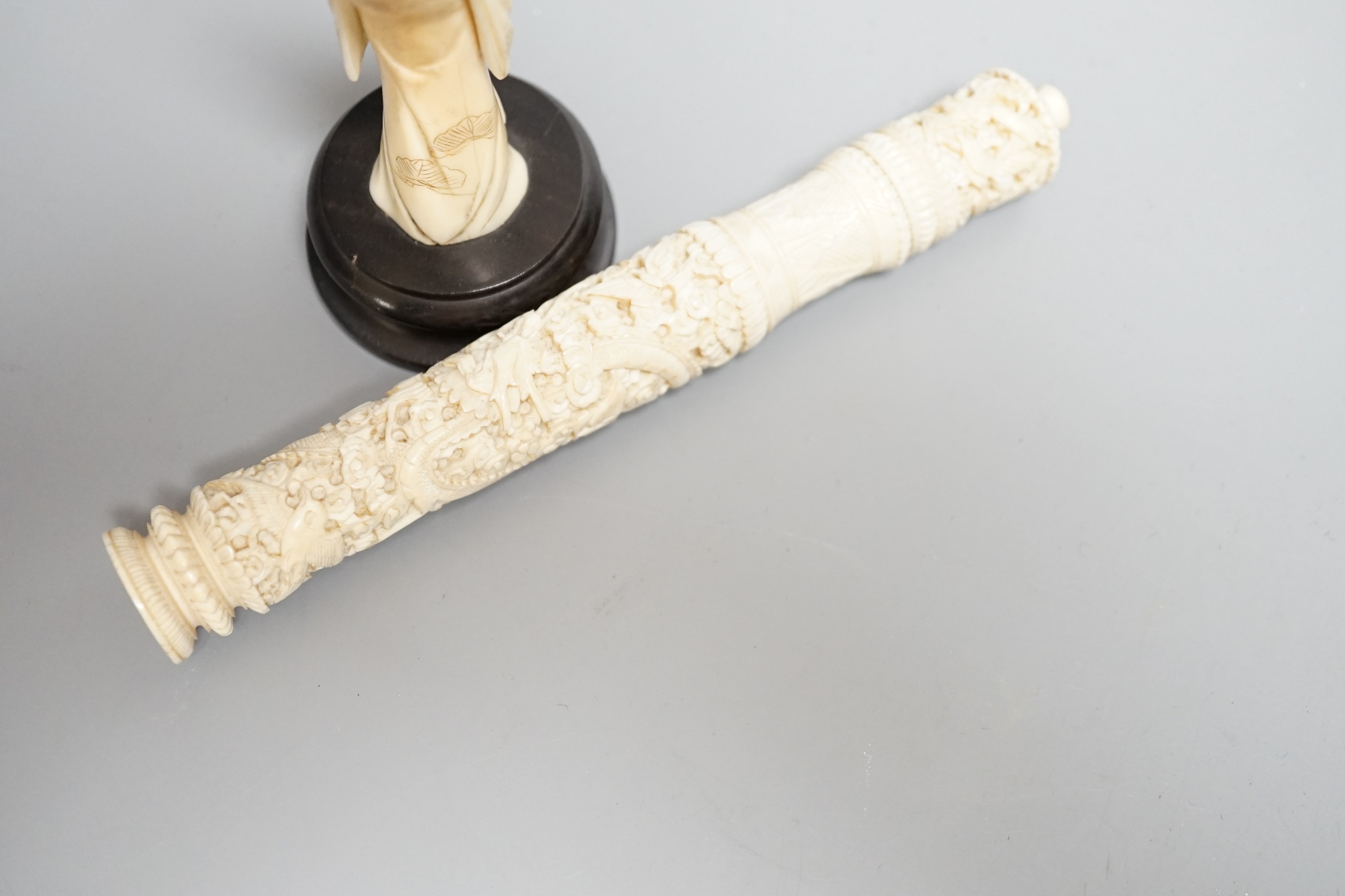 A Chinese export carved ivory bodkin case, 16cm, and a Japanese ivory figure of a geisha